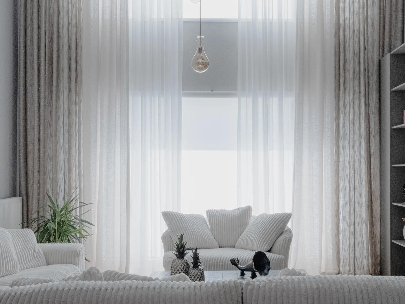 Bright living room with sheer curtains representing deep and one-time cleaning
